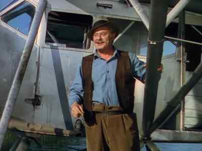 Hey, Johnny, if you catch up
with that chiseler - Captains of the Clouds