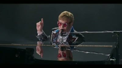 ♪ Hey, kids
why don't you plug into the faithless? ♪ - Elton John Live: Farewell from Dodger Stadium