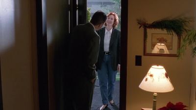 - Hi.
- Hi. I'm here to see Dana Scully. - The X-Files