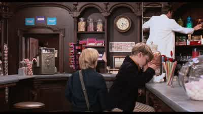 - Hi. - I'd like a bar of chocolate, please. - Willy Wonka &amp; the Chocolate Factory