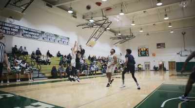 Highler launches a three,
right wing, short. - Last Chance U: Basketball