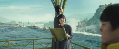 His affectionate gestures
reached out to - Along with the Gods: The Two Worlds