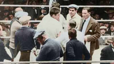 HIS ATTITUDE IN DEFEAT
IS APPLAUDED - America in Color