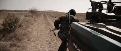 His face is covered with his signature
tactical shemagh, - Jarhead: Law of Return