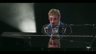 ♪ His family business thrives ♪ - Elton John Live: Farewell from Dodger Stadium