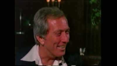 His girlfriends are on either
side or a couple on either - Secrets of Playboy