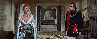 His right arm rests on the Scottish throne - Quentin Durward