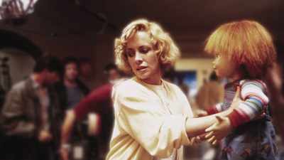 His wife is Catherine
Hicks who played - Living with Chucky