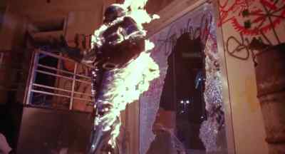 Hit him in the mouth! - RoboCop 3