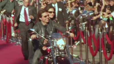 Hitting the red carpet
with new romantic partner, - Tom Cruise: The Last Movie Star