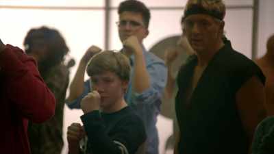 -Hiyah!
-[students grunting] - Cobra Kai