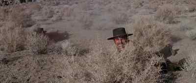 Hold your fire.
They're out of range. - Joe Kidd