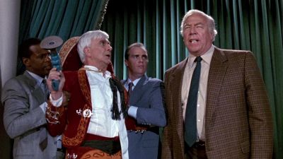 Hold it Frank is right There is a fraud in this room - The Naked Gun 2½: The Smell of Fear