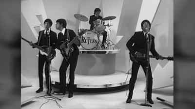 ♪ Hold my hand, yeah, yeah - The Rutles: All You Need Is Cash