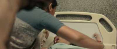 Hold her legs. She might rip her stitches!
It's okay, dear. Everything's alright. - Chithha