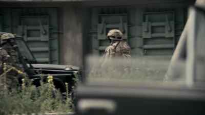 - Holding position at north entrance.
- Copy that. - Strike Back