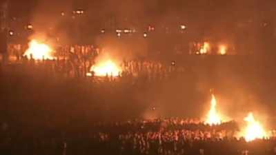 Holy shit.
It's Apocalypse Now  out there. - Woodstock 99: Peace Love and Rage