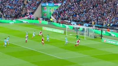Hopped on by Ramsey,
steadying himself was Özil, - All or Nothing: Manchester City