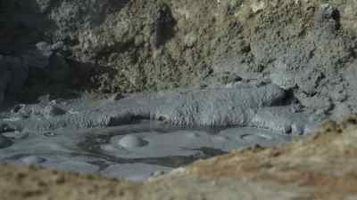 Hot springs and bubbling pools
of liquid mud. - Prehistoric Planet