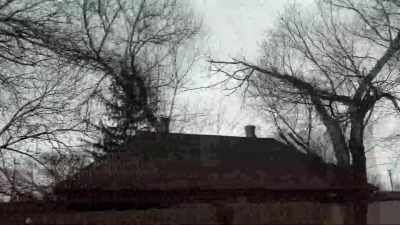 Houses hit by shells burn. - 20 Days in Mariupol
