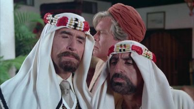 How come you have a blond blue eyed slave hm - Cannonball Run II