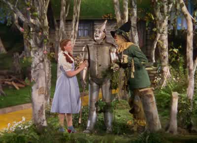 Goodness How did you ever get like thisWell about a year agoI was chopping that treewhen suddenly it began to rainAnd right in the middle of a chop I rusted solidAnd I've been that way ever sinceWell you're perfect nowMy neck My neckPerfectBang on my - The Wizard of Oz