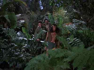 - How much farther is the cliff?
- Not far now. - The Time Tunnel
