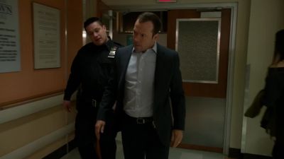 How is she?
She took a shiv
in her back, - Blue Bloods
