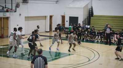 Howing once again fires a three
and sinks it. - Last Chance U: Basketball