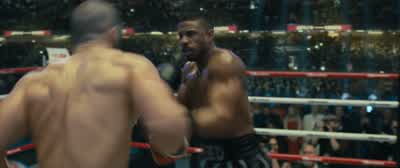 Huge uppercut has Creed holding on now. - Creed II