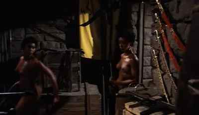 Hurry! Take the gun! - Ilsa, Harem Keeper of the Oil Sheiks