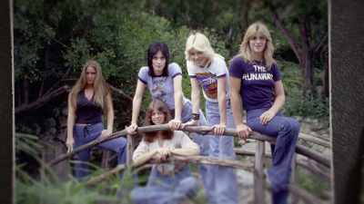 I was a girl that loved
playing rock 'n' roll. - Women Who Rock