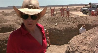I am surrounded by cow turds - Holes