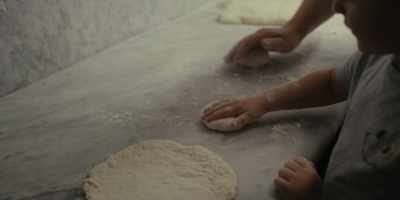 I was born a year after
my dad opened his pizzeria. - Chef's Table: Pizza