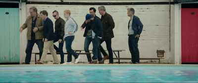 I can't even smile like that,
never mind do the legs. - Swimming with Men