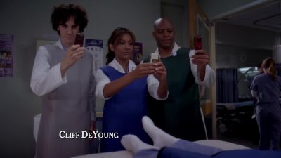 [cell phone cameras clicking] - Grey's Anatomy
