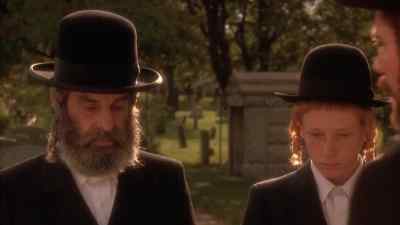 - Dayan ha-emmes.
- Omein. - A Stranger Among Us