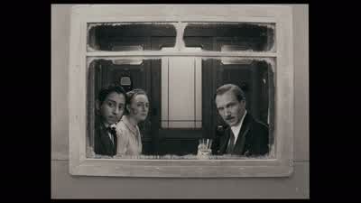 I find these black uniforms very drab - The Grand Budapest Hotel