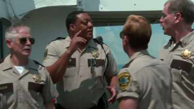 I forgot, the crazy Black
captain "Bonofrise" - Reno 911! The Hunt for QAnon