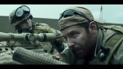 I got a military-age male......that's on a cell phone, watching the convoy. - American Sniper