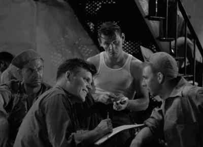 I got four guys on the front gate,
two on the roof. - Riot in Cell Block 11