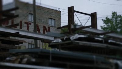 I see a sign on the building. - Law & Order: Organized Crime