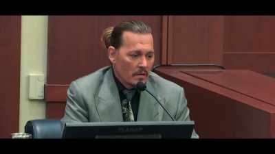 I was just sitting there
looking at the dirty carpet, - Depp V Heard