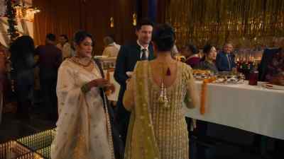 I know you two still
haven't eaten. Here. - Christmas with the Singhs