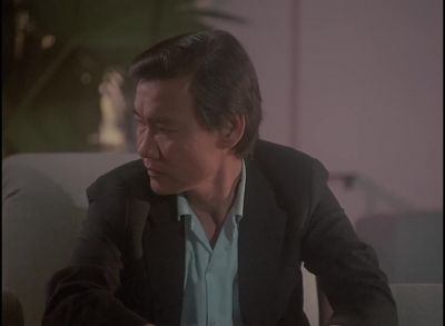 [Lifts Receiver From Cradle] - Miami Vice
