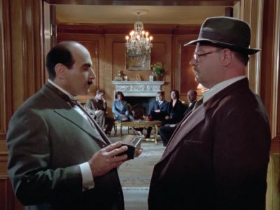 Non, monsieur.
You may keep your pipe. - Agatha Christie's Poirot