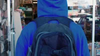 I parked the car and walked
around the stores, - I Was a Teenage Felon