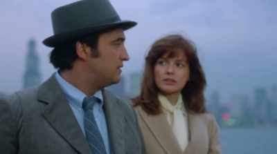 I play a reporter. - Belushi