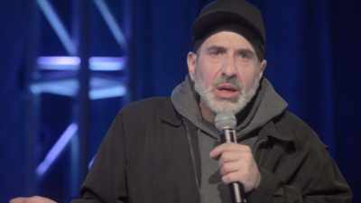 I put one in this ear, one in that ear, - Dave Attell: Hot Cross Buns