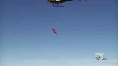 RATHER THAN DROPPING STRAIGHT
DOWN LIKE A NORMAL SKYDIVER, - Man vs. Wild